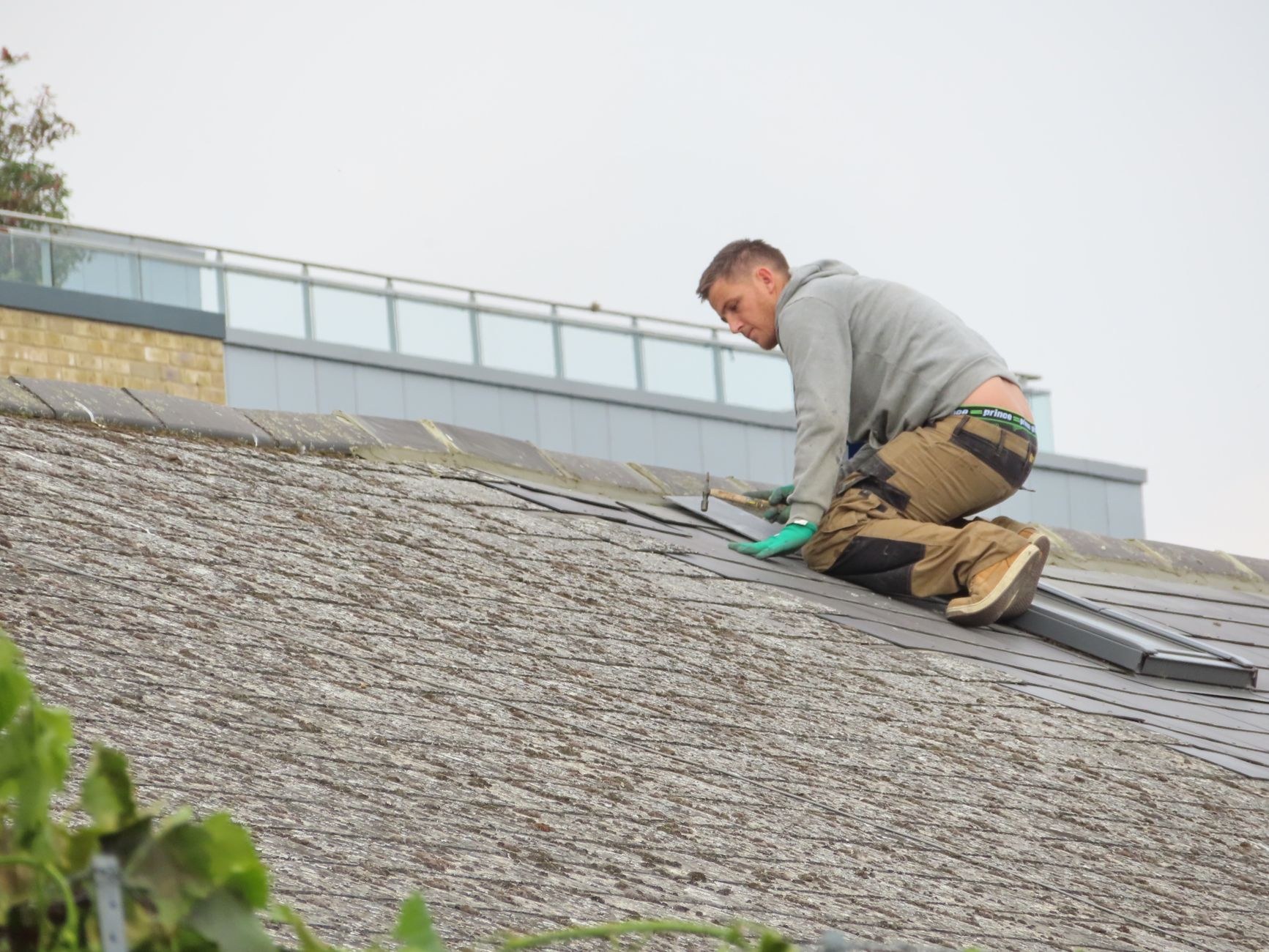 Roofer working on a roof